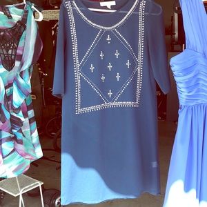 Sheer turquoise tunic with gold detail